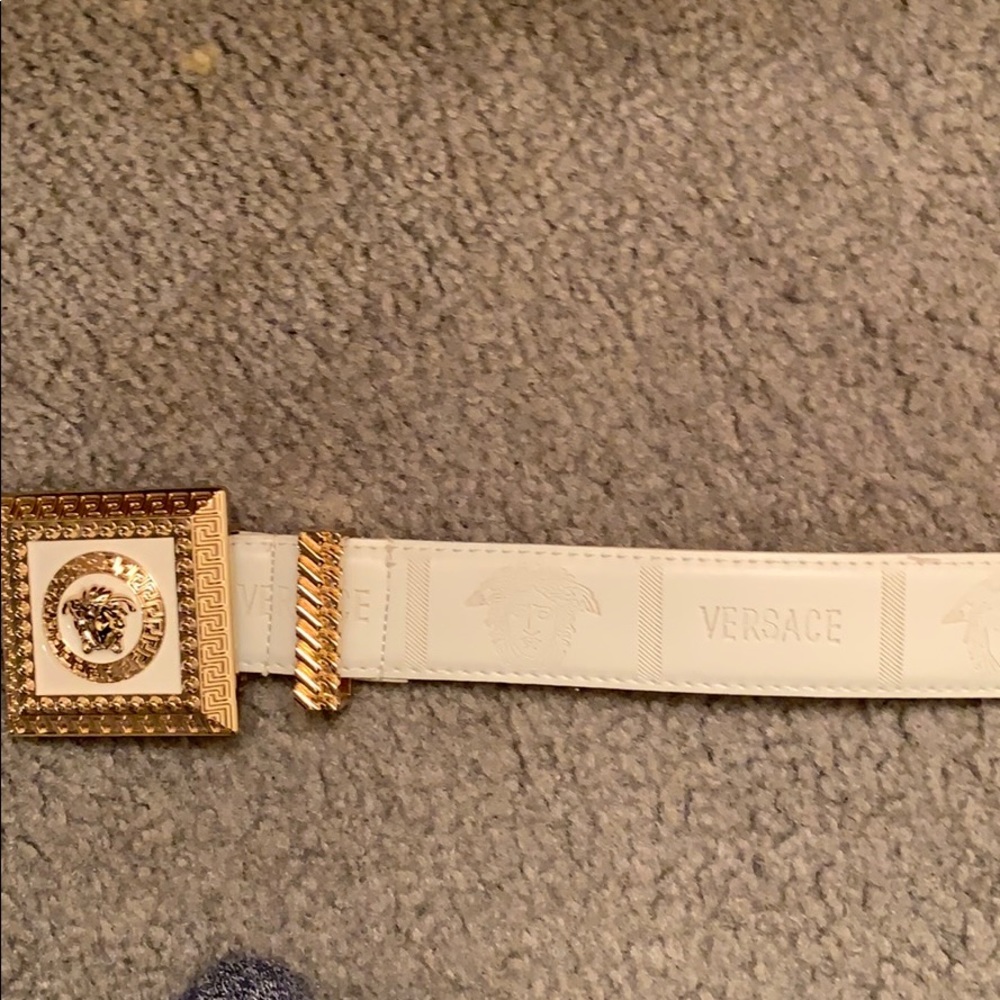 Men’s white and gold Versace belt